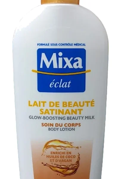 Flacon Mixa Éclat satinant aux huiles de coco et d’argan, bouchon jaune