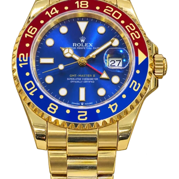 Montre dorée à cadran bleu et lunette rouge et bleue